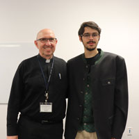 Sean Effron and Father Barry