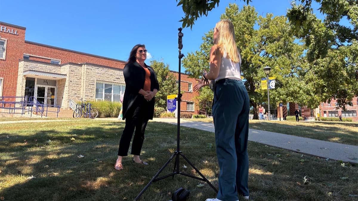Amanda Egan being interviewed