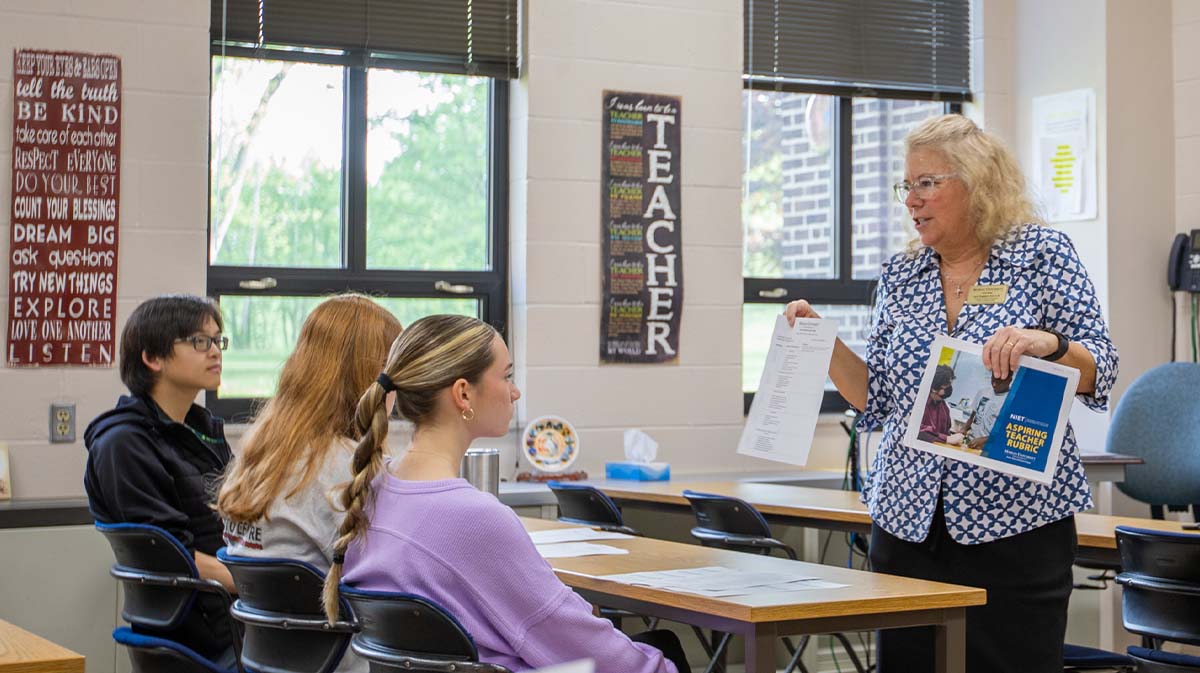 Teacher teaching students in a classroom