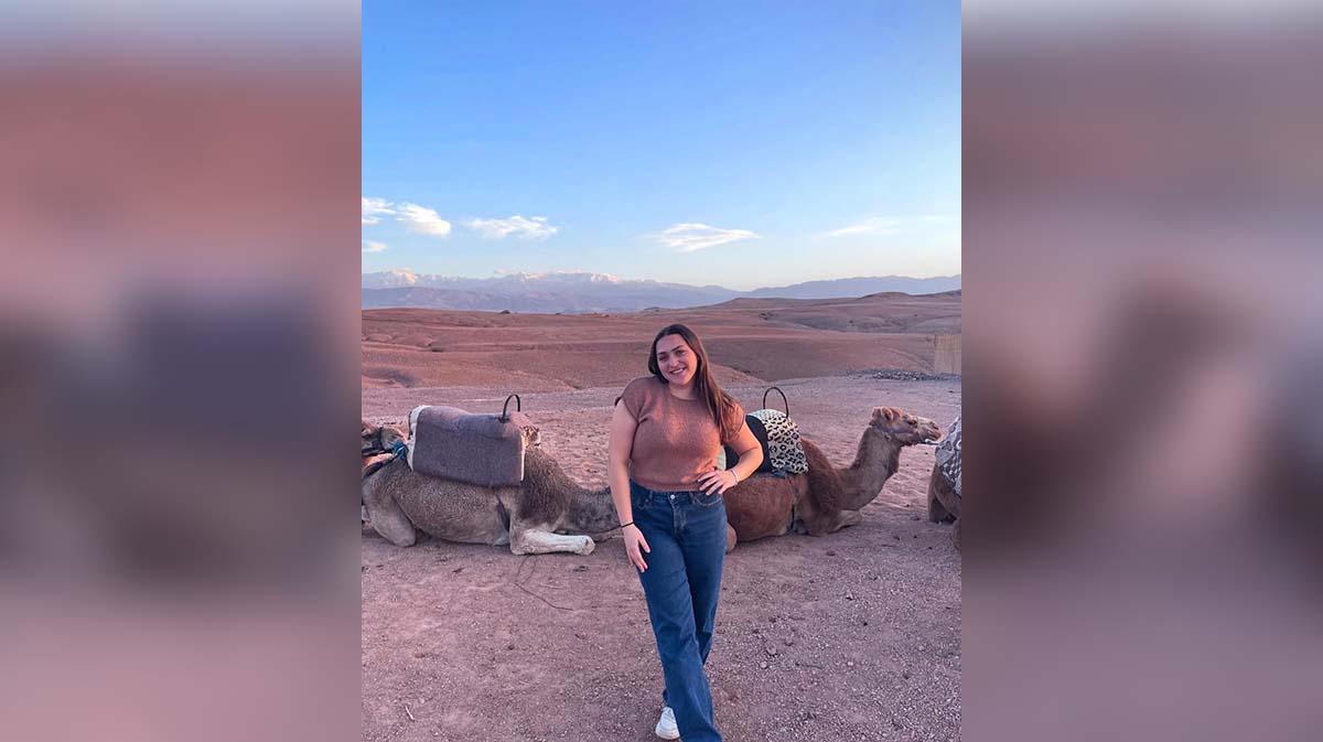 Ava Cothern ‘27 posing with camels
