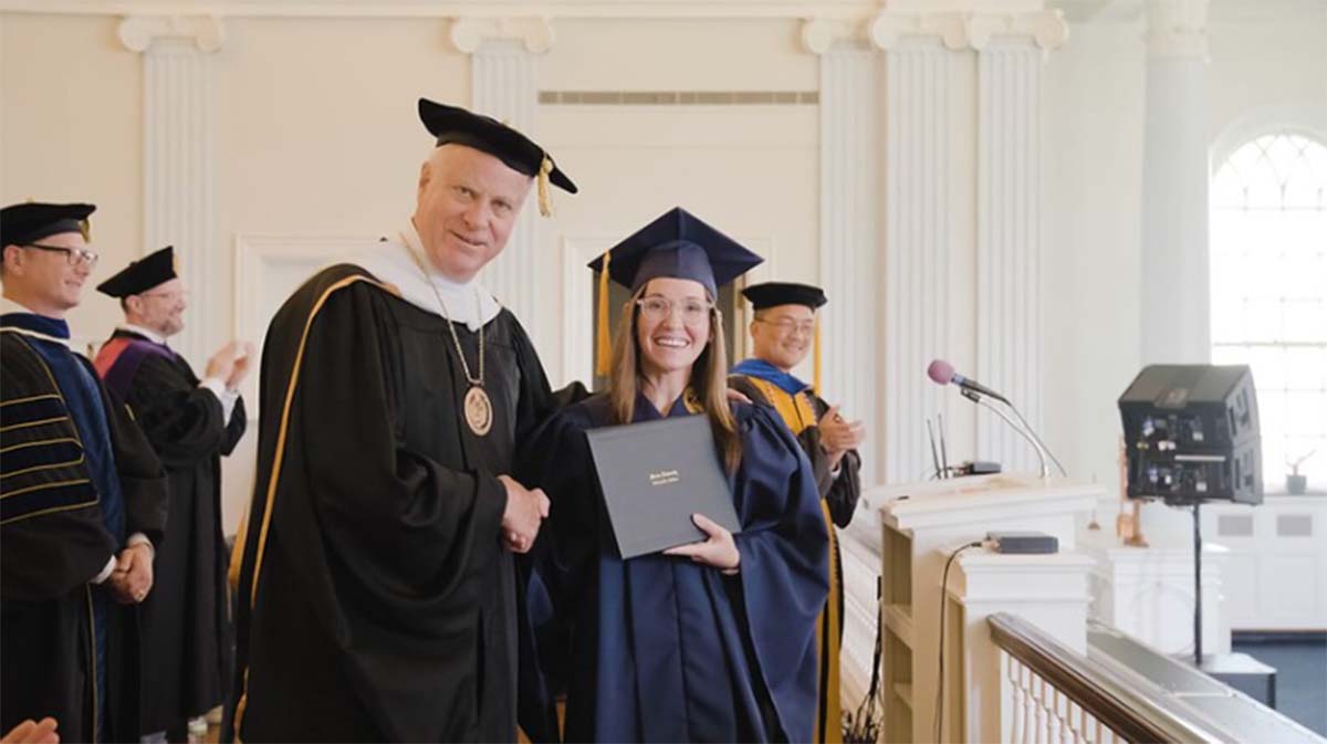 President Elsener with Women's Prison partnership graduate