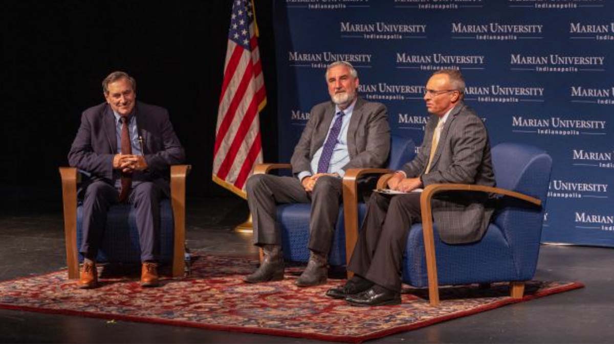 3 panelists on stage