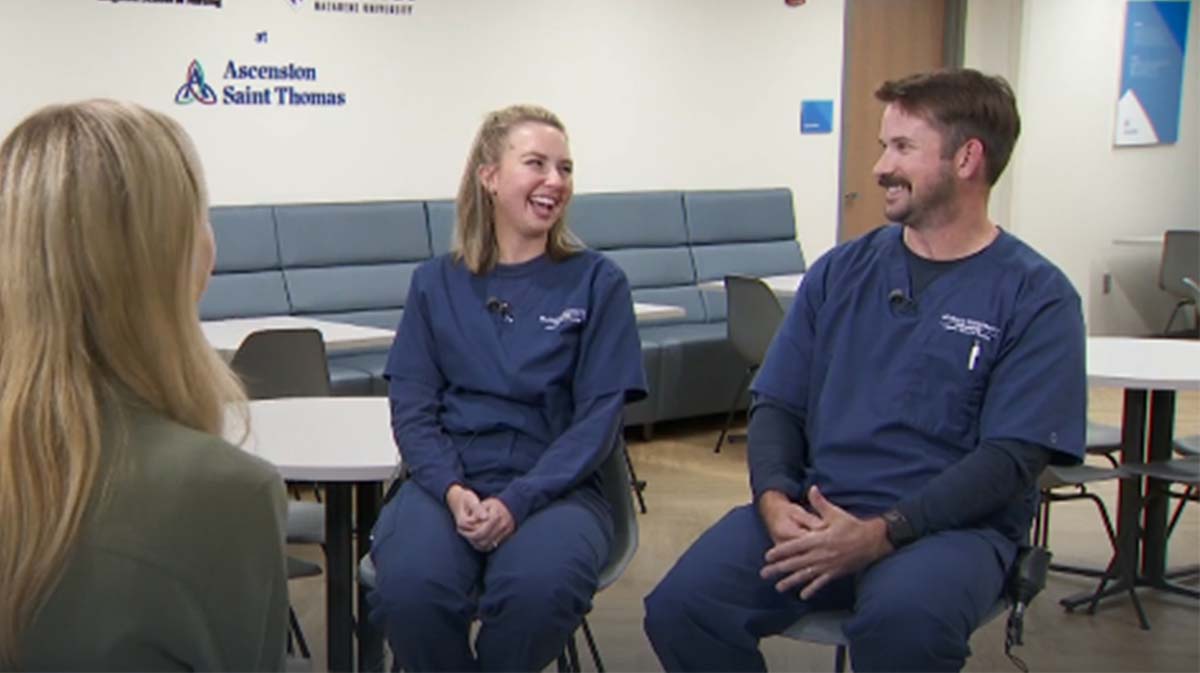 Two student nurses speaking with an interviewer