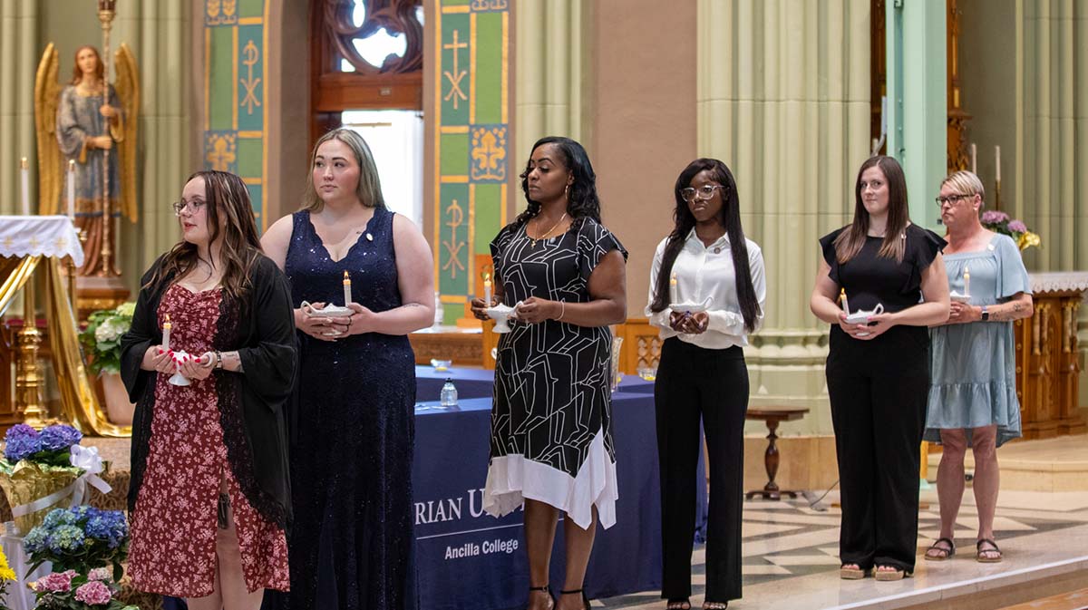 Nursing students receiving pins