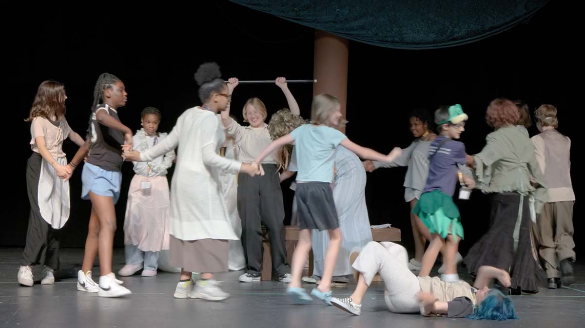 Students on stage at Theatre Camp