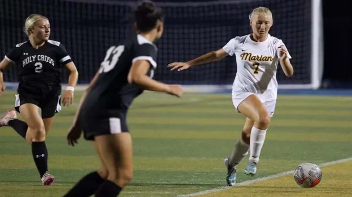 Women playing soccer