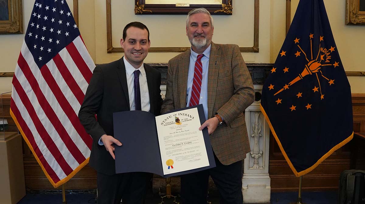 Cris Creighton with Governor Holcomb