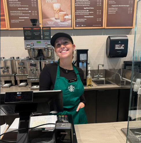 student working at starbucks