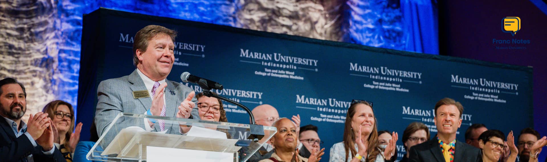 GME team celebrating on stage during Match Day