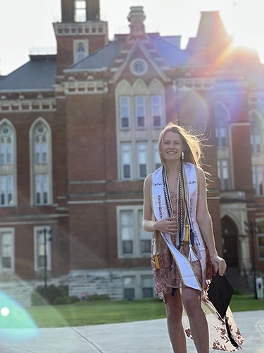 Nika in graduation regalia