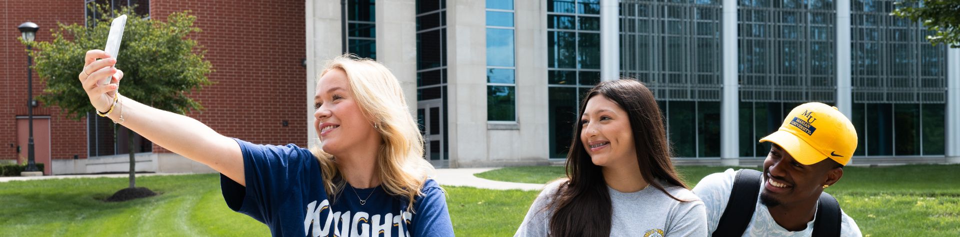 Students smiling for selfie