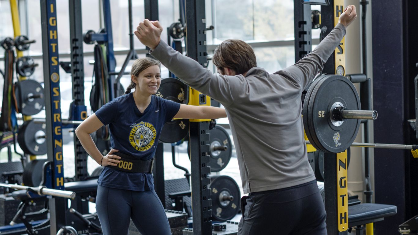 Students exercising together in a gym