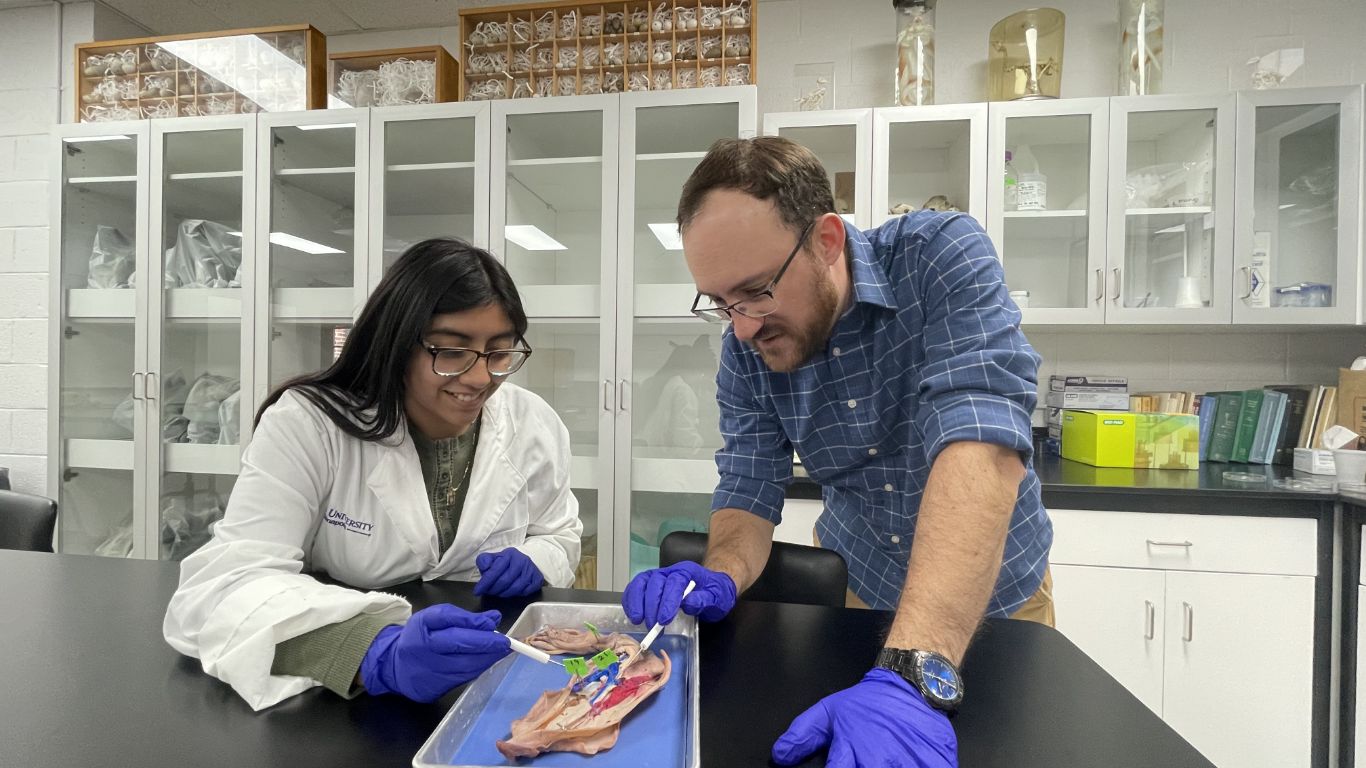 Professor and Student in biology lab