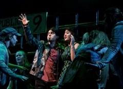 Students acting on stage