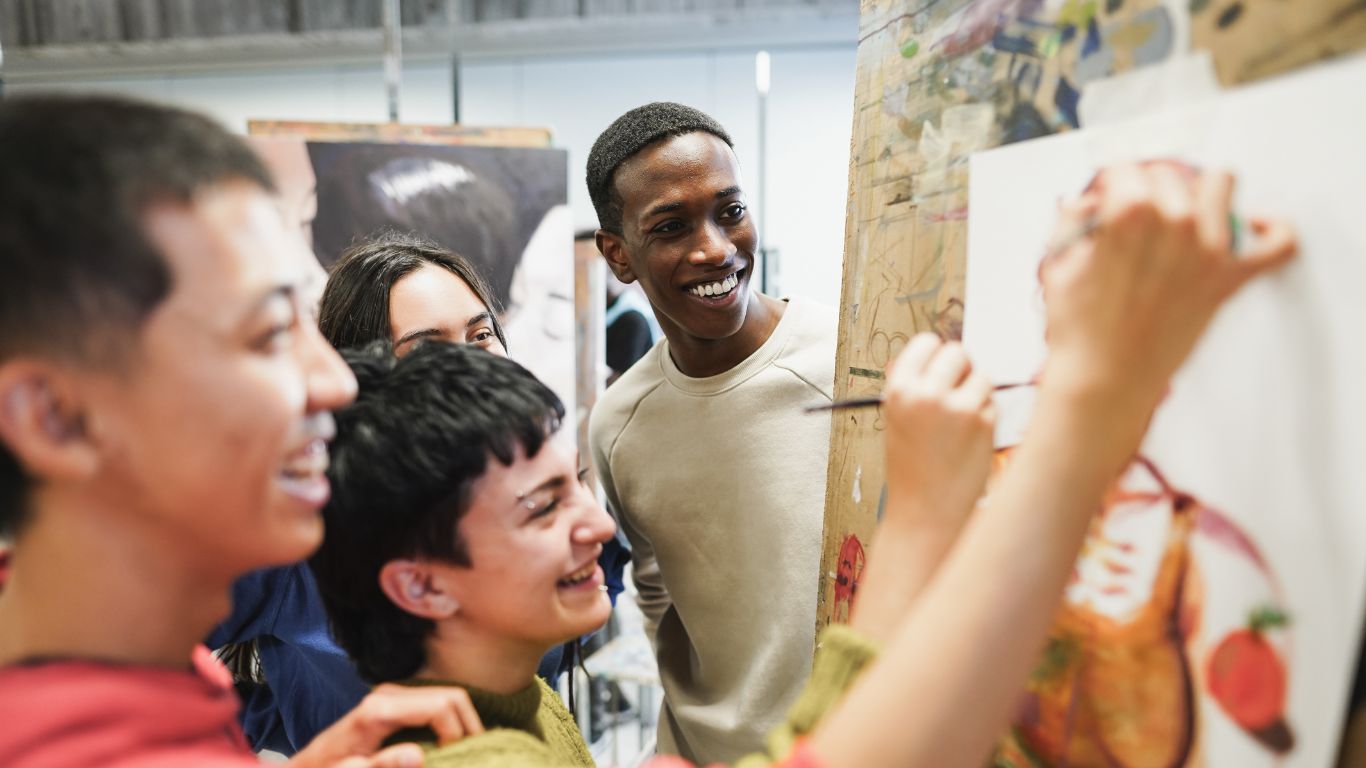 Students painting together