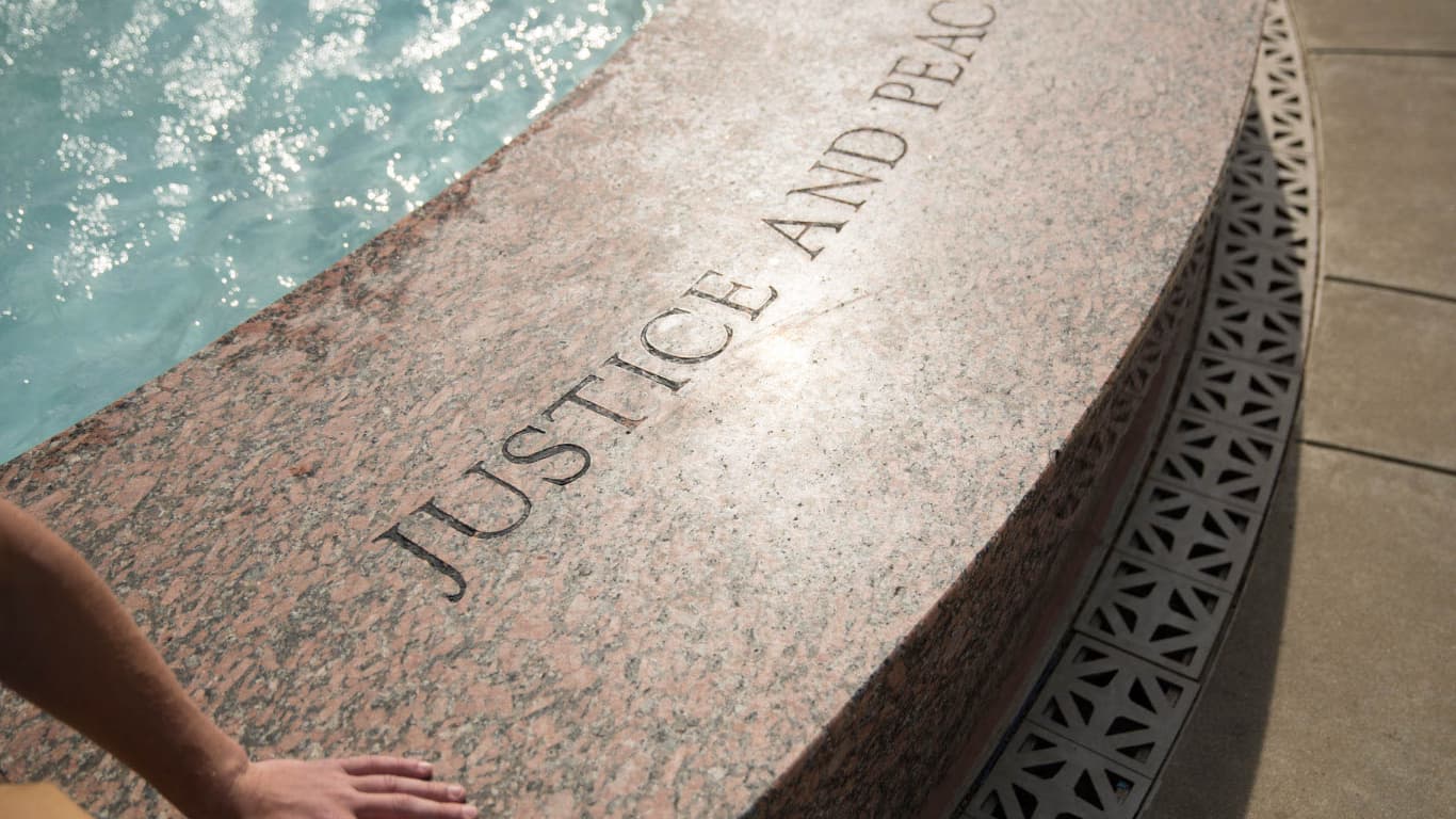 Justice and Peace engraved into fountain