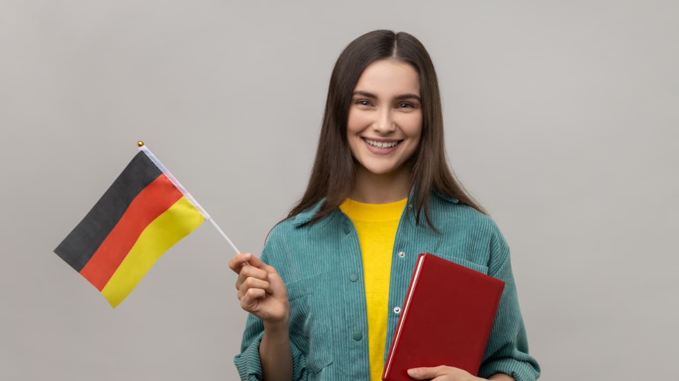 Student holding German flag