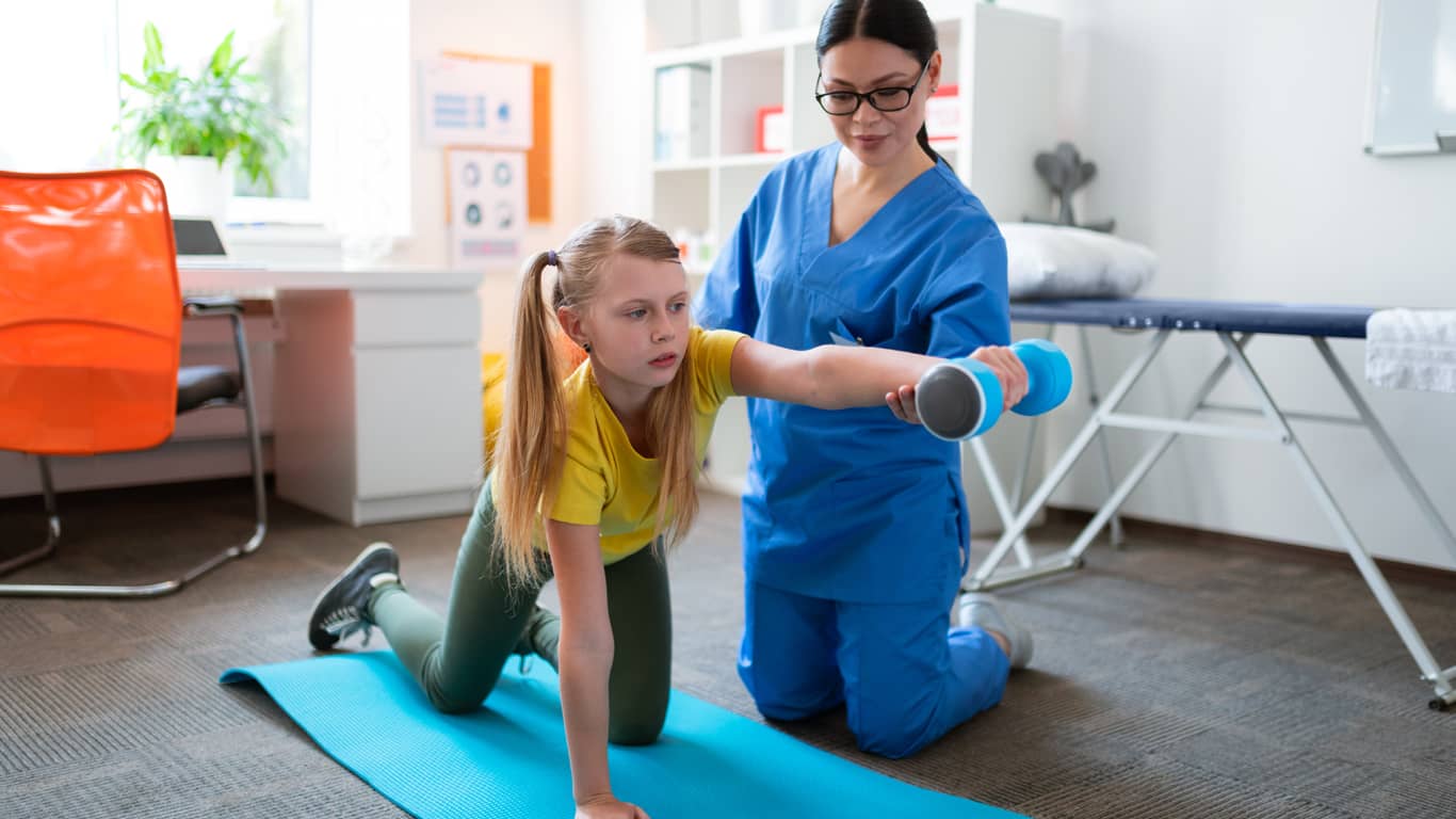 Doctor helping child patient