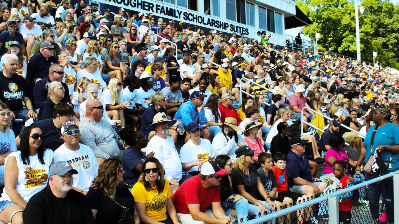 A crowd of fans at a Marian sporting eventg