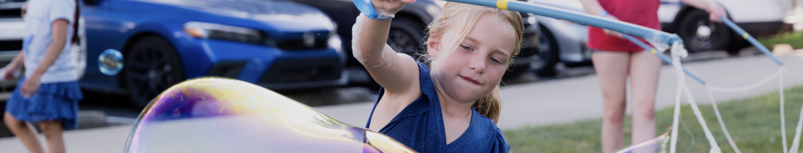 Participant creating large bubbles