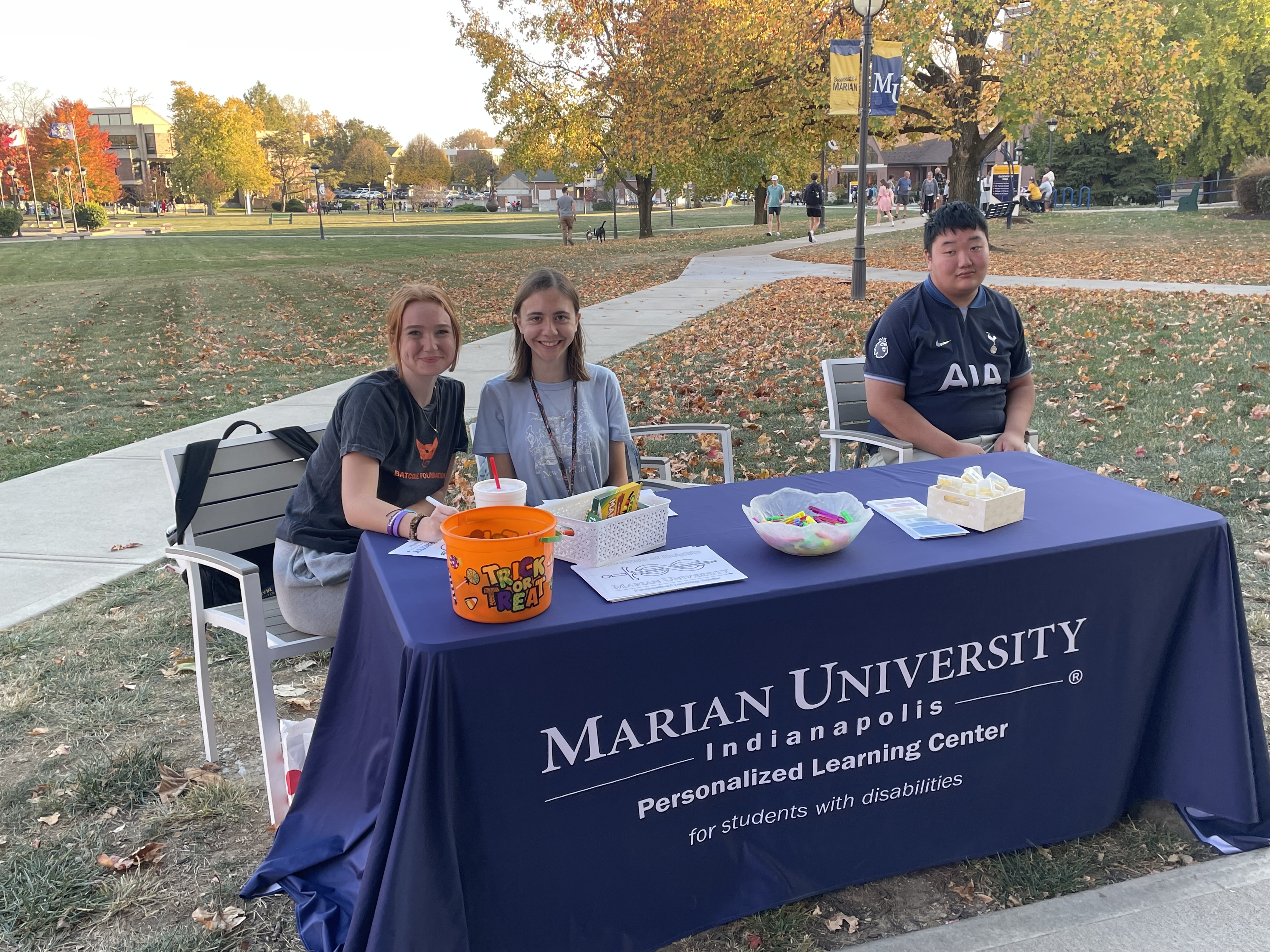 Students at a table representing Marian University’s Personalized Learning Center...