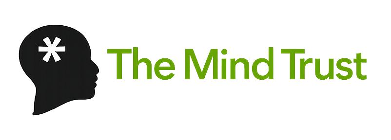 The Mind Trust logo with a black head silhouette containing a white asterisk next to green text reading “The Mind Trust.”