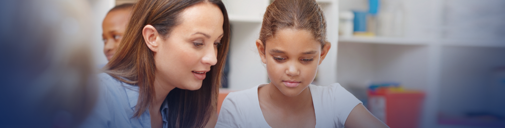 Teacher and student working together