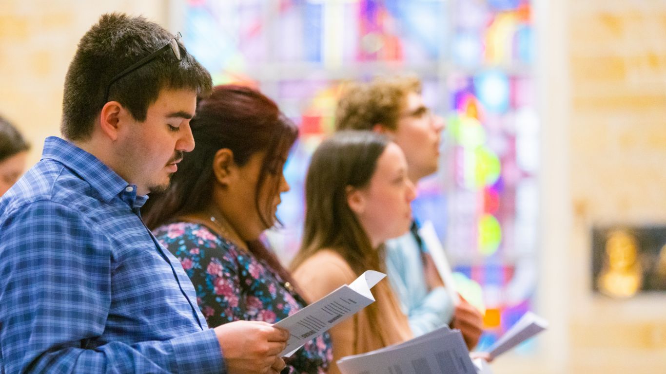 Worshipers participating in Mass
