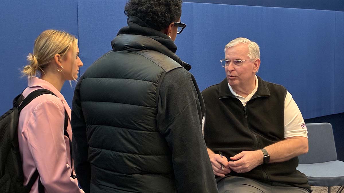Greg Ballard speaking with Marian students